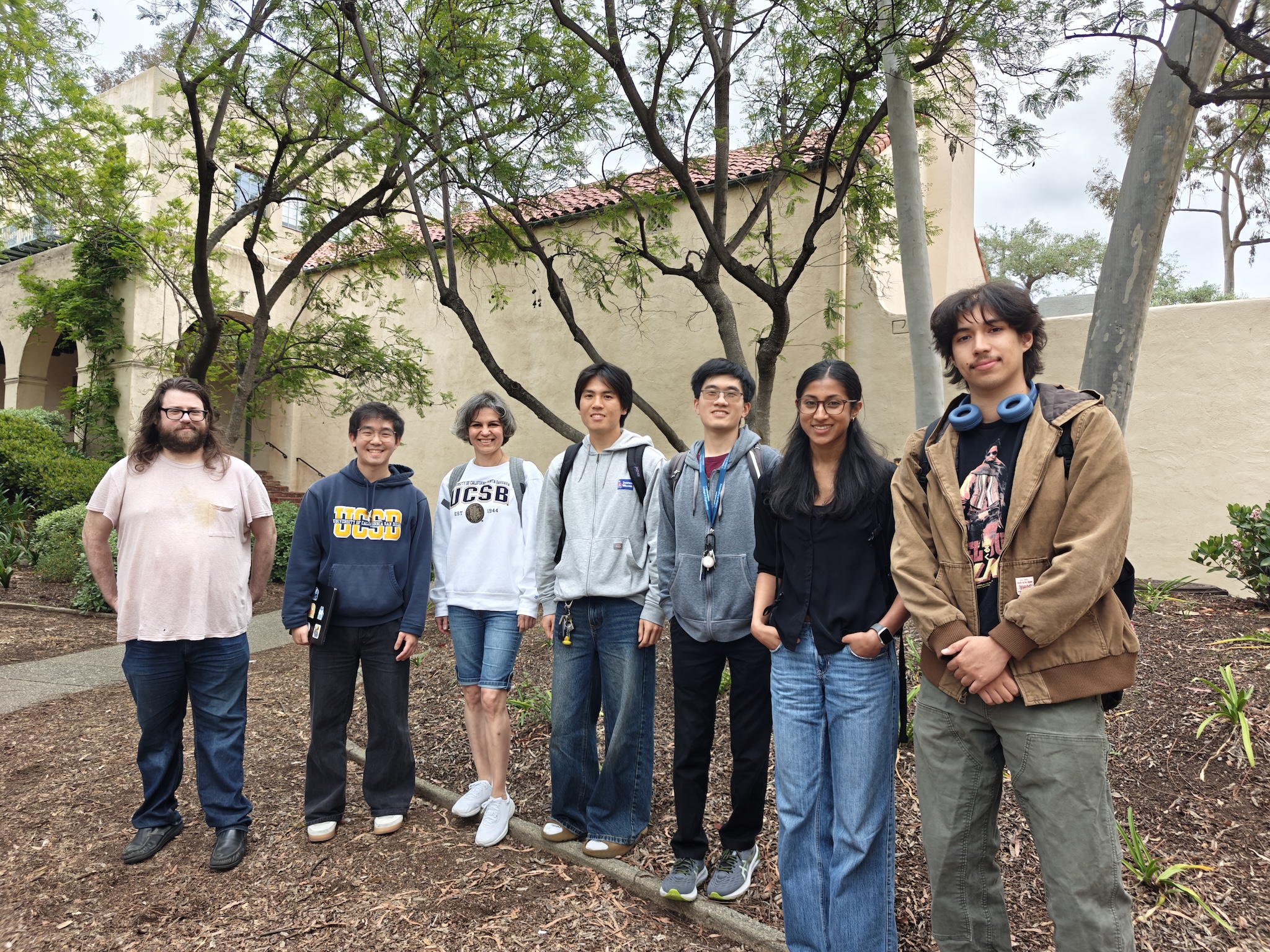 Maryam Majedi and students in front of the entrance at CalTech