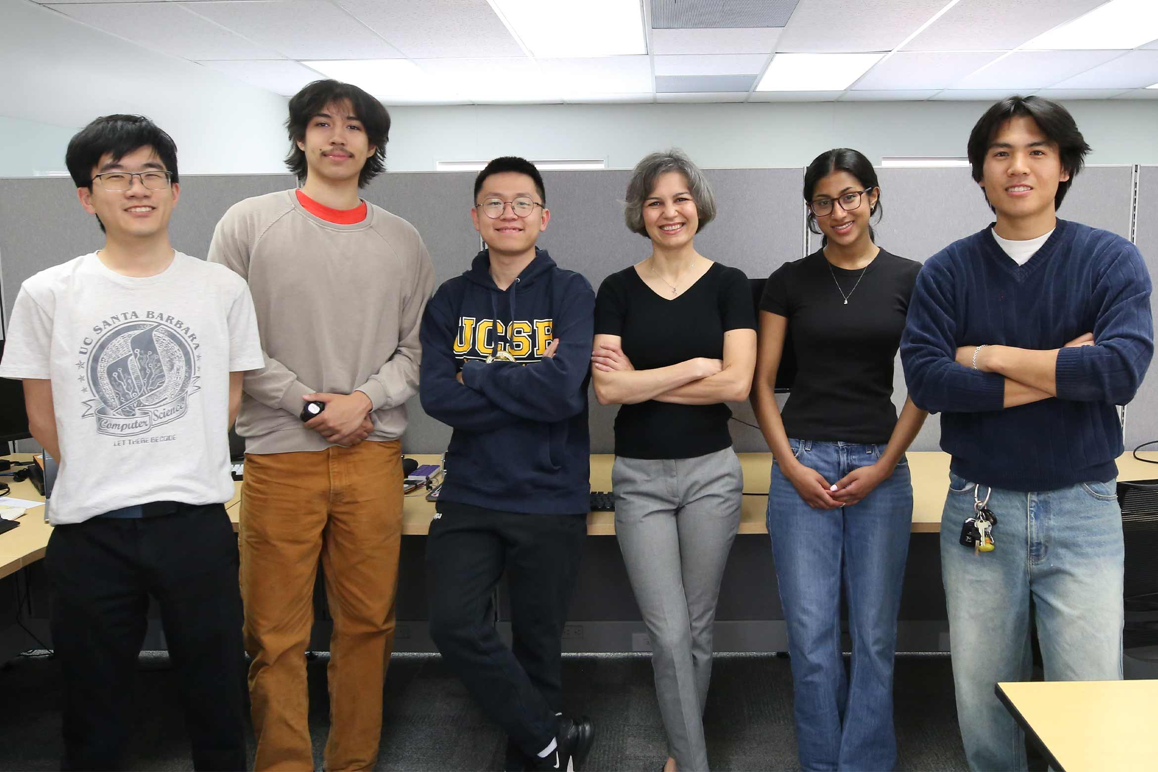 Maryam Majedi and group in an office