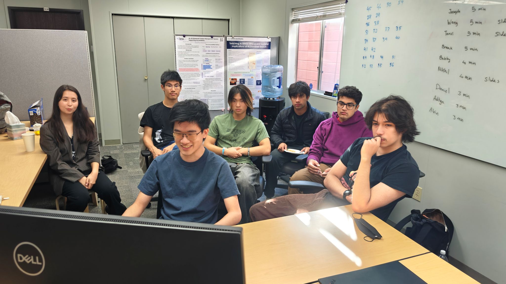 Seven students presenting in a Zoom meeting