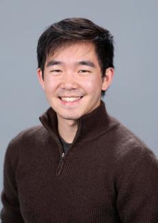 Jedidiah Tsang against a gray background